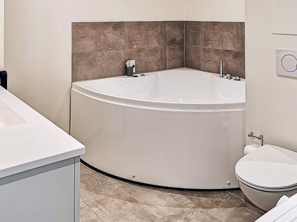 Koupelna v ubytování Luxury Spa Apartment in Sondervig - By Traum Ferienwohnungen