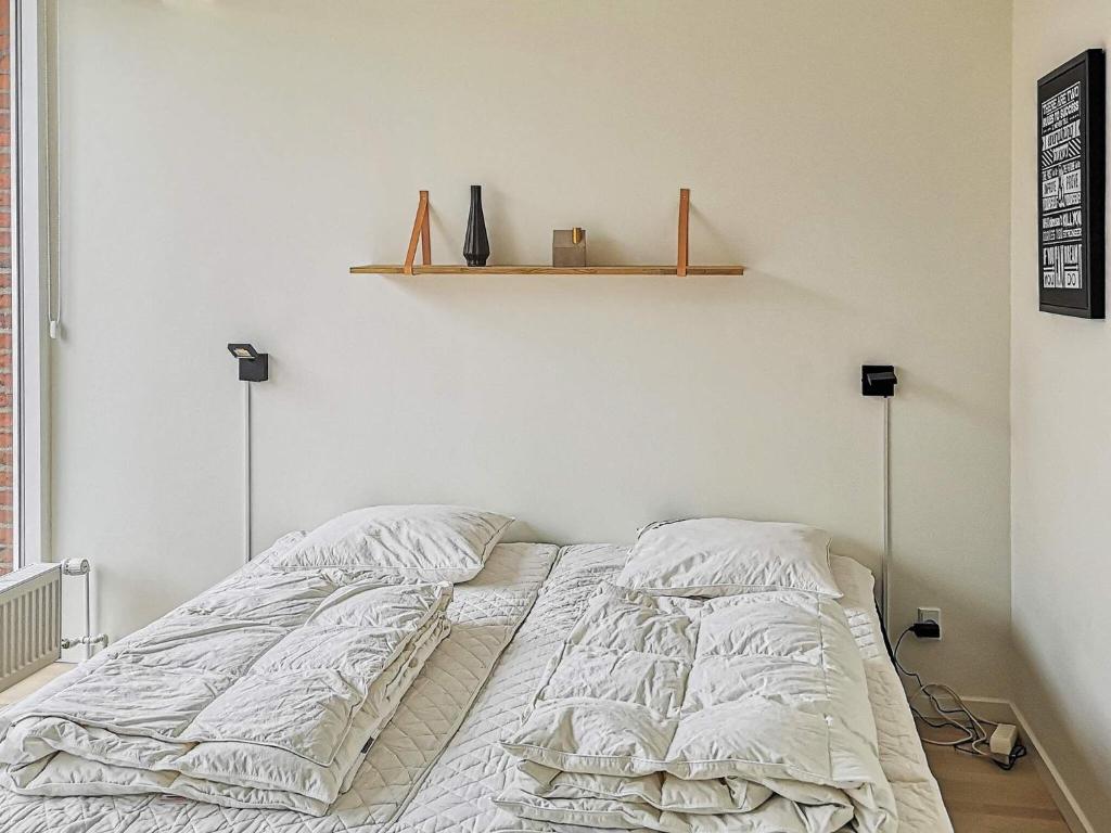 Postel nebo postele na pokoji v ubytování Luxury Spa Apartment in Sondervig - By Traum Ferienwohnungen
