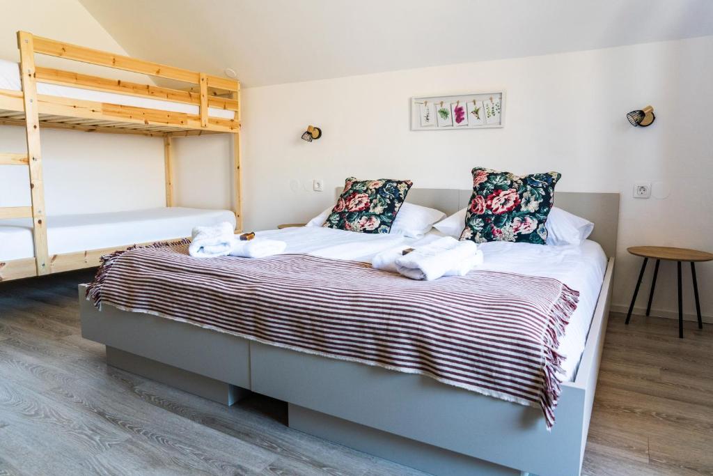 Postel nebo postele na pokoji v ubytování Apartmaji Triglav