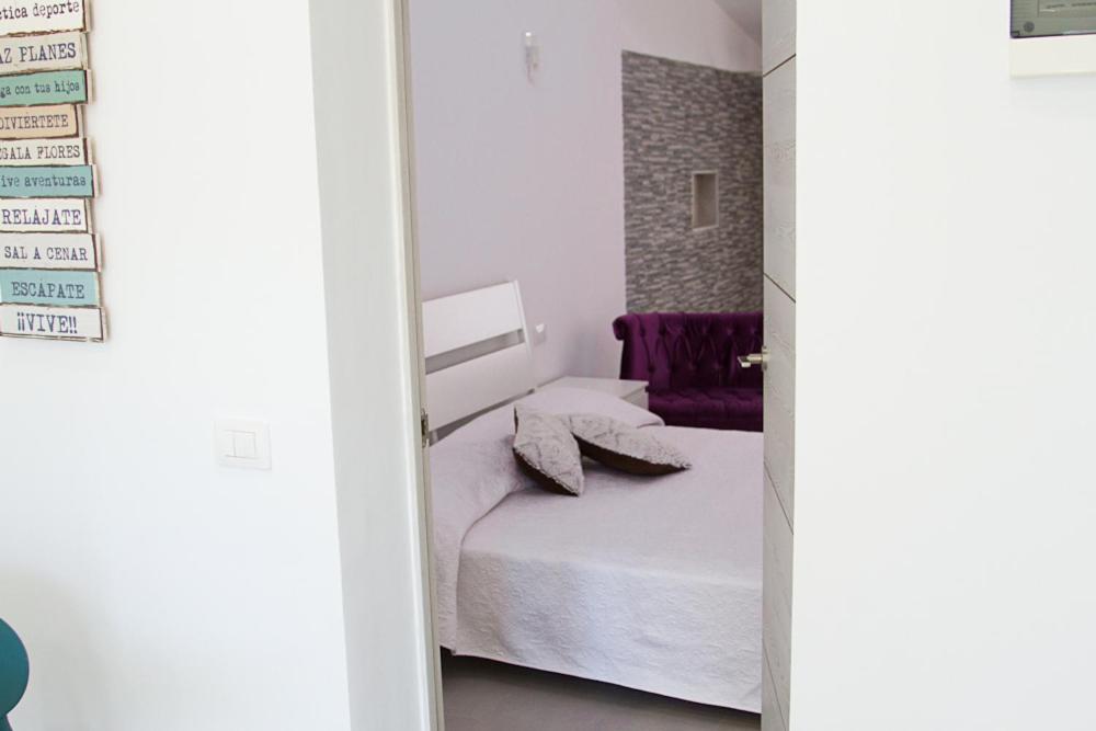 A bed or beds in a room at White House - Clasto