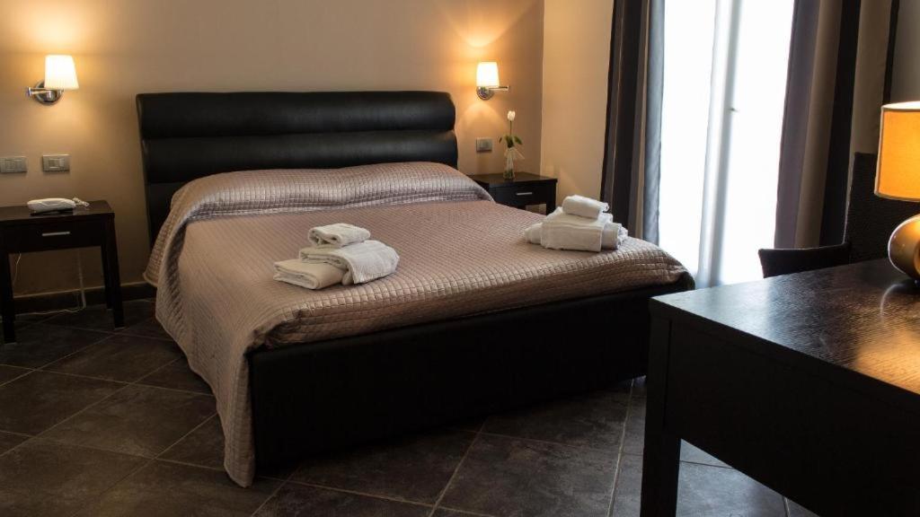 Postel nebo postele na pokoji v ubytování Hotel La Cavalera