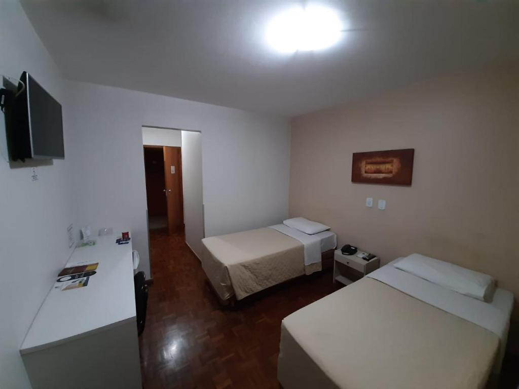 Postel nebo postele na pokoji v ubytování Hotel Londri Star