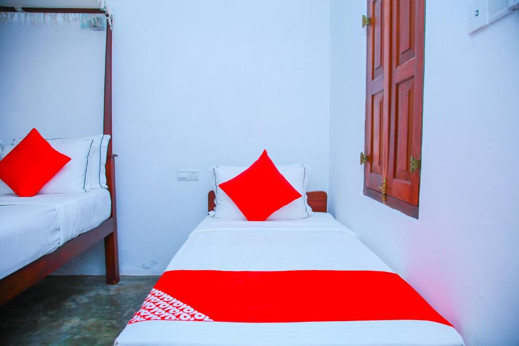Postel nebo postele na pokoji v ubytování Hotel Nawathana
