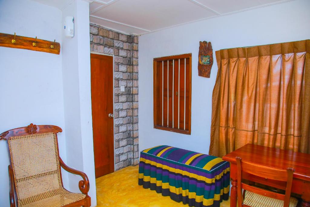 Postel nebo postele na pokoji v ubytování Hotel Nawathana
