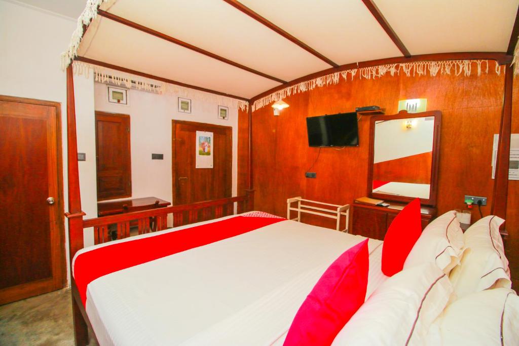 Postel nebo postele na pokoji v ubytování Hotel Nawathana