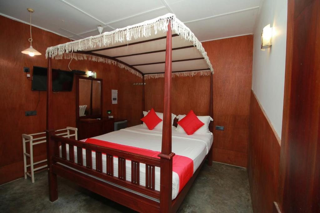 Postel nebo postele na pokoji v ubytování Hotel Nawathana