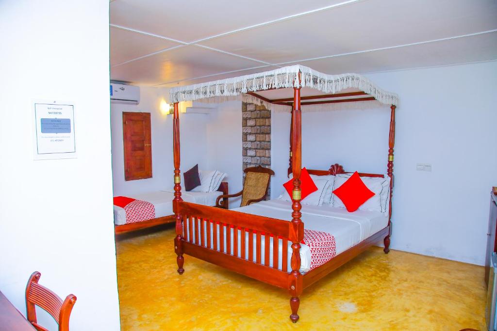 Postel nebo postele na pokoji v ubytování Hotel Nawathana