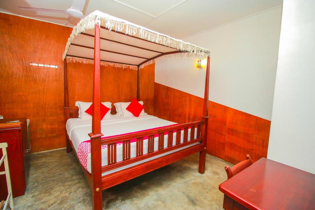 Postel nebo postele na pokoji v ubytování Hotel Nawathana