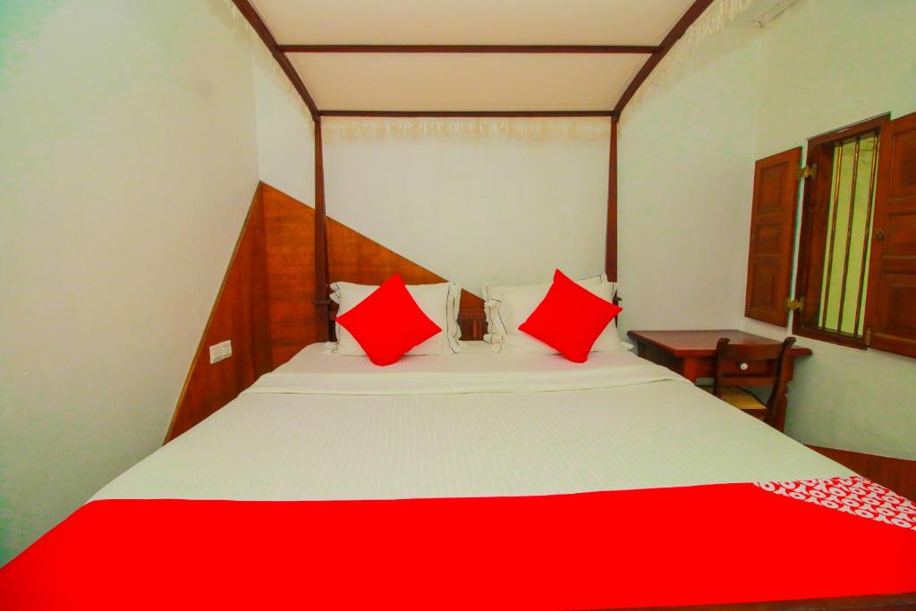 Postel nebo postele na pokoji v ubytování Hotel Nawathana