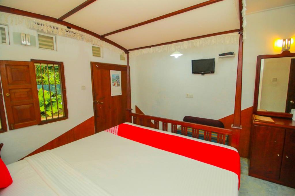 Postel nebo postele na pokoji v ubytování Hotel Nawathana