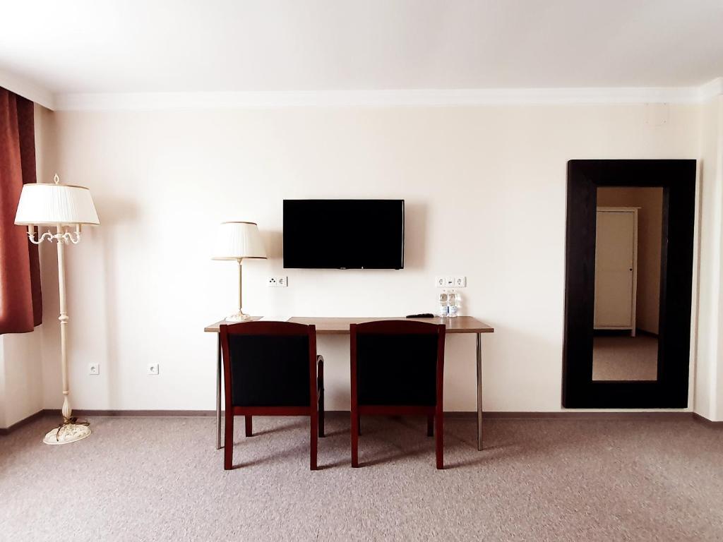 TV a/nebo společenská místnost v ubytování Hotel Pause