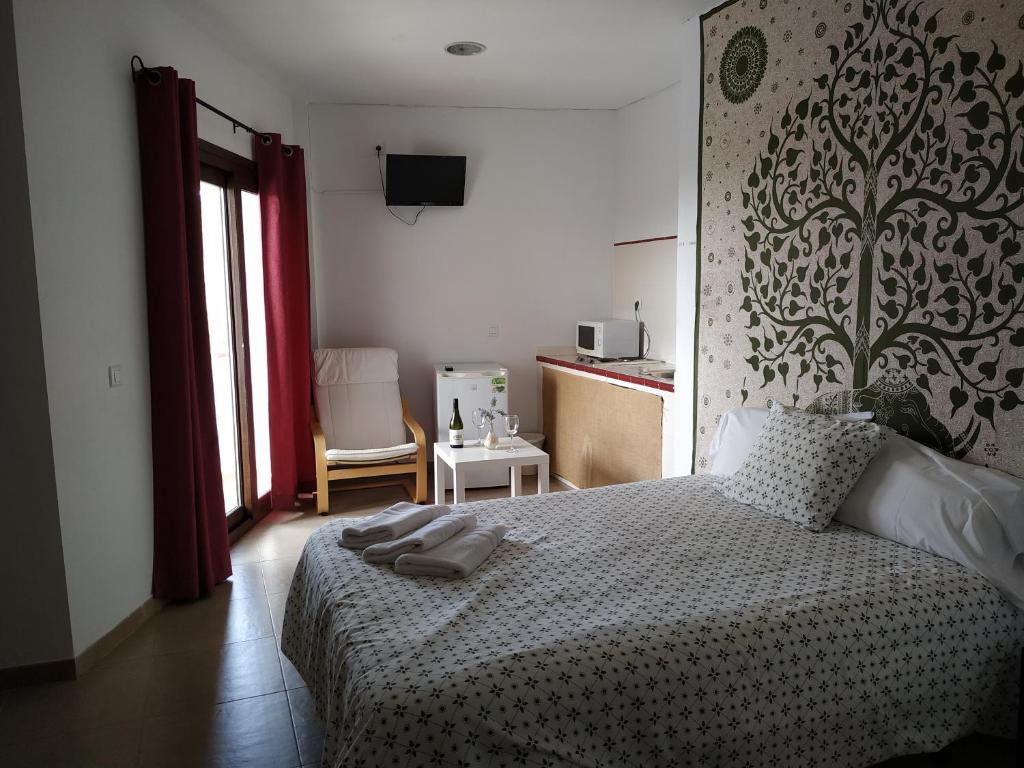 Cama o camas de una habitación en Centro de Naturaleza Cañada Verde "El Parque de Naturaleza con mas experiencias de Andalucía""