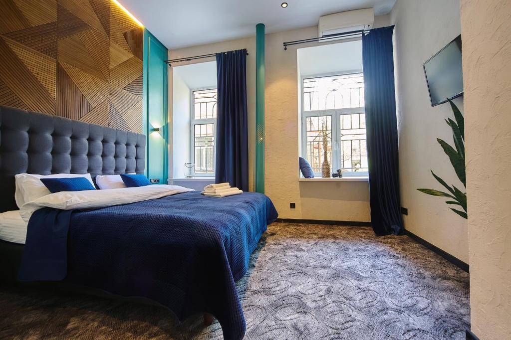 Postel nebo postele na pokoji v ubytování Hotel Buninn