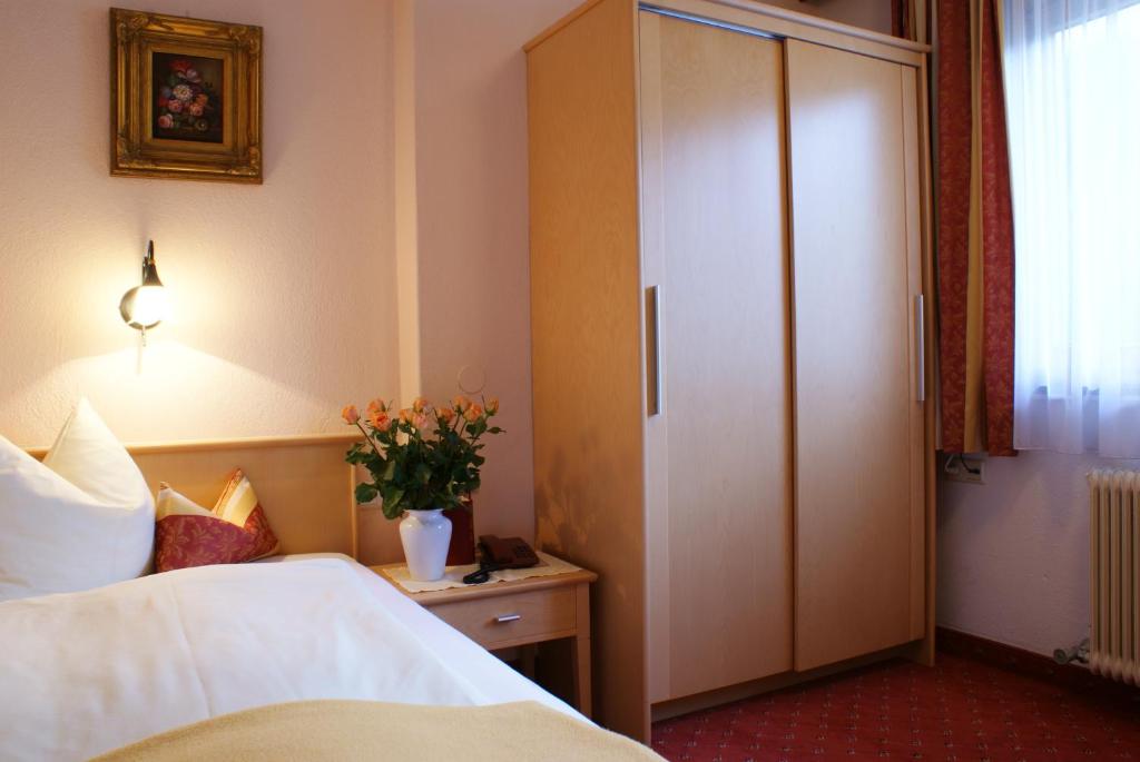 Postel nebo postele na pokoji v ubytování Gasthof Riederhof
