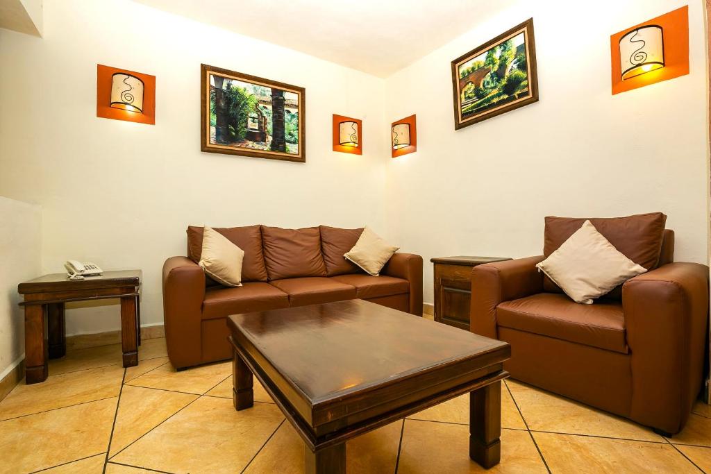 Posezení v ubytování Hotel Casa del Virrey & Suites