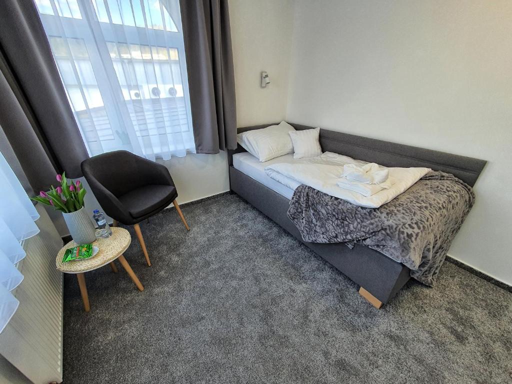 Postel nebo postele na pokoji v ubytování Penzion Gemer
