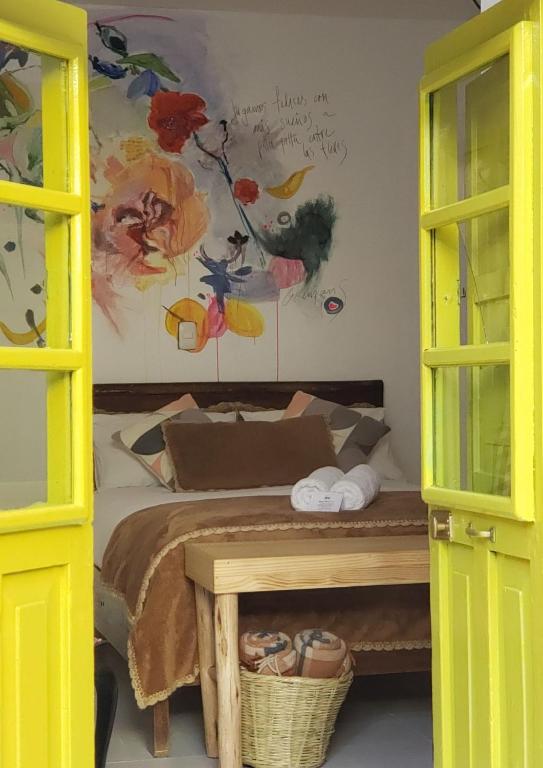 Postel nebo postele na pokoji v ubytování Niños Hotel Meloc