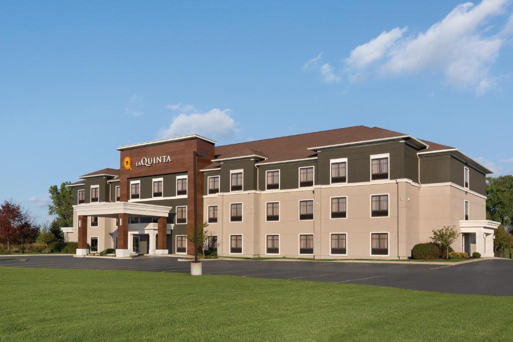a rendering of a hotel with a building at La Quinta by Wyndham Lackawanna in Lackawanna