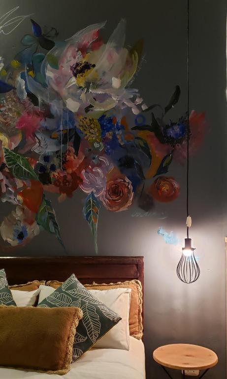 Postel nebo postele na pokoji v ubytování Niños Hotel Meloc