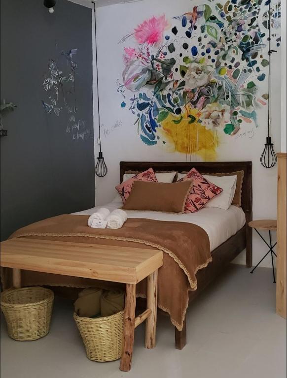 Postel nebo postele na pokoji v ubytování Niños Hotel Meloc