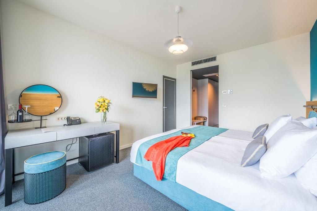 Postel nebo postele na pokoji v ubytování Hotel Nestos