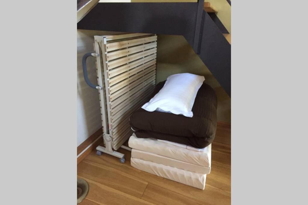 Postel nebo postele na pokoji v ubytování TOOD一宮 -B棟