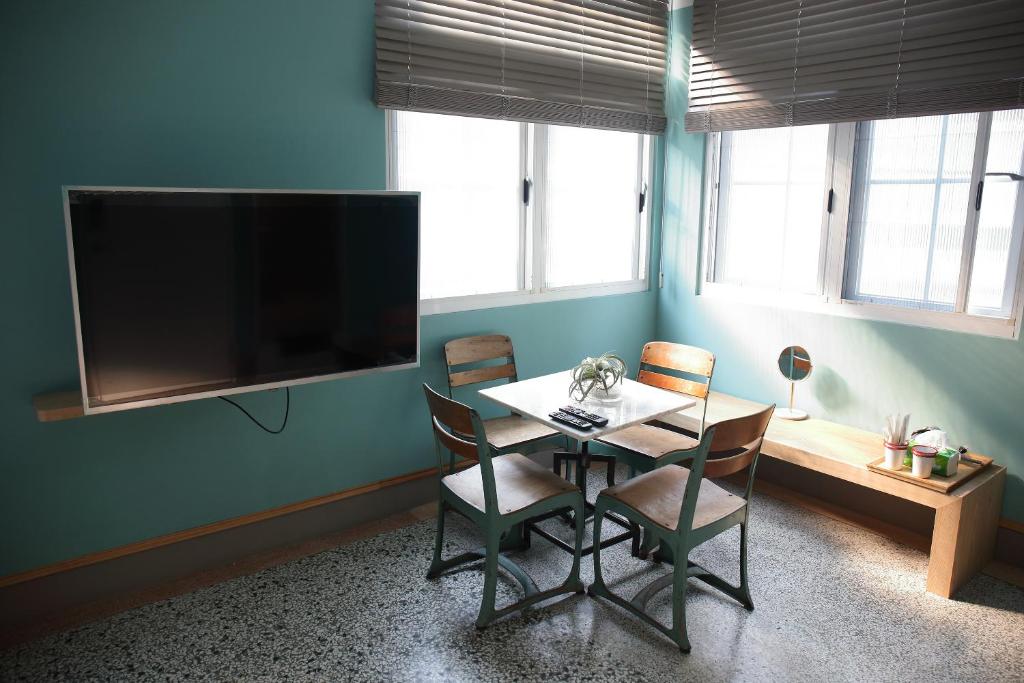TV a/nebo společenská místnost v ubytování Spring Guest House
