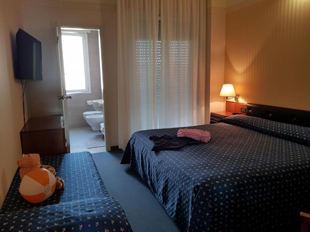 Postel nebo postele na pokoji v ubytování Hotel Esplanade