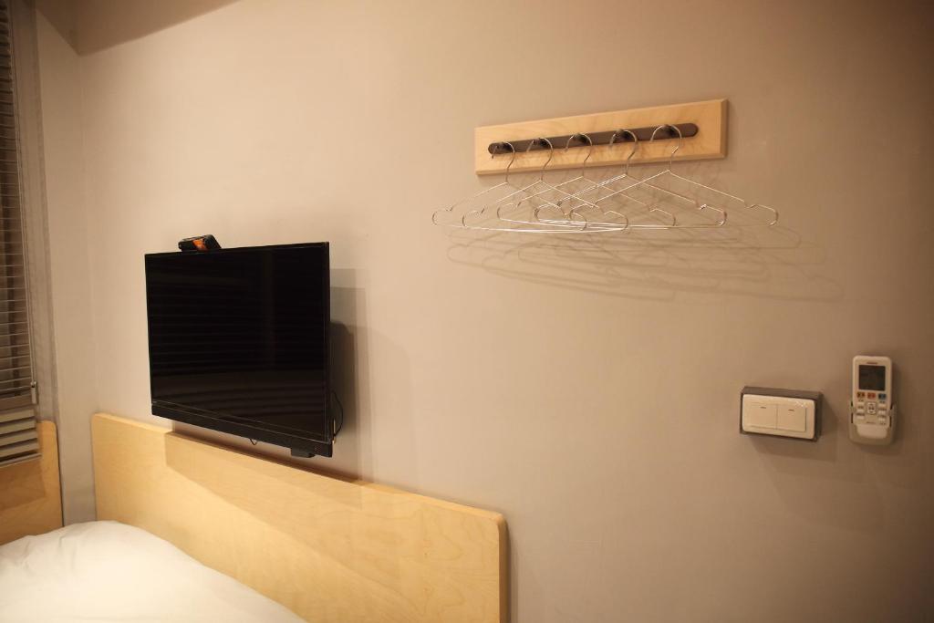 TV a/nebo společenská místnost v ubytování Spring Guest House