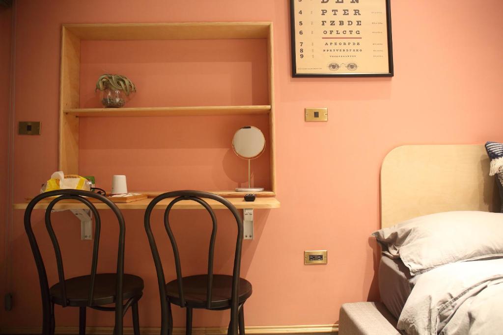 Postel nebo postele na pokoji v ubytování Spring Guest House