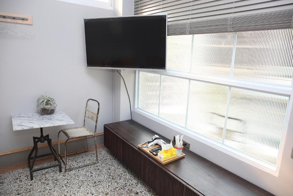 TV a/nebo společenská místnost v ubytování Spring Guest House