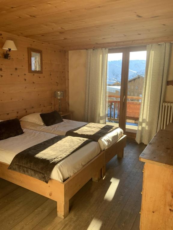 Postel nebo postele na pokoji v ubytování Alp'azur