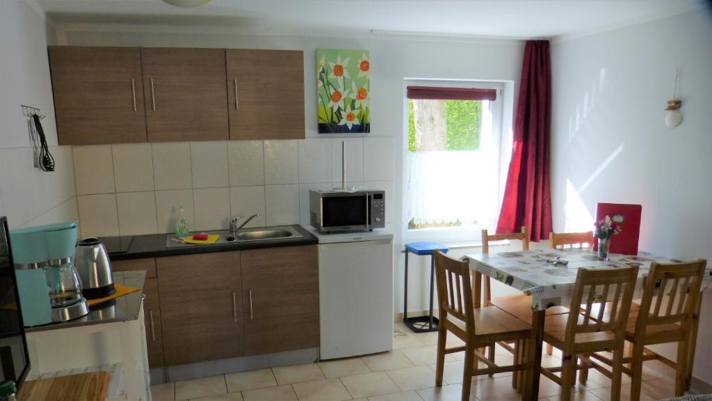 Kuchyň nebo kuchyňský kout v ubytování Bernstein Appartements