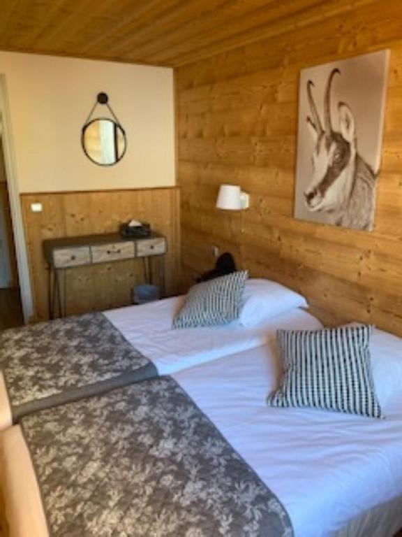 Postel nebo postele na pokoji v ubytování Alp'azur