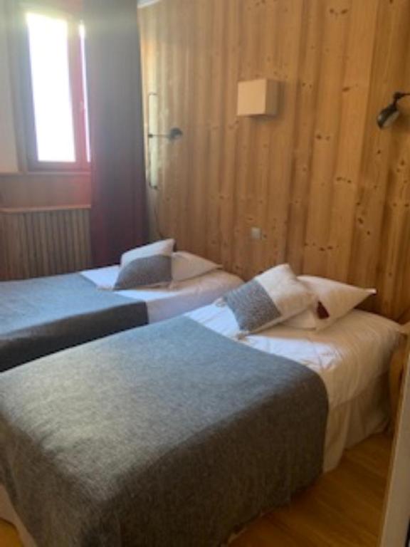 Postel nebo postele na pokoji v ubytování Alp'azur