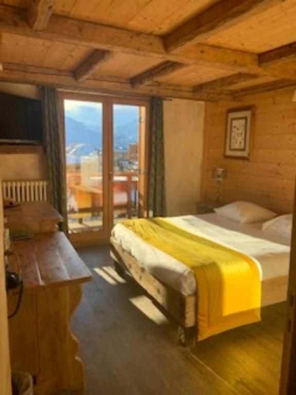 Postel nebo postele na pokoji v ubytování Alp'azur