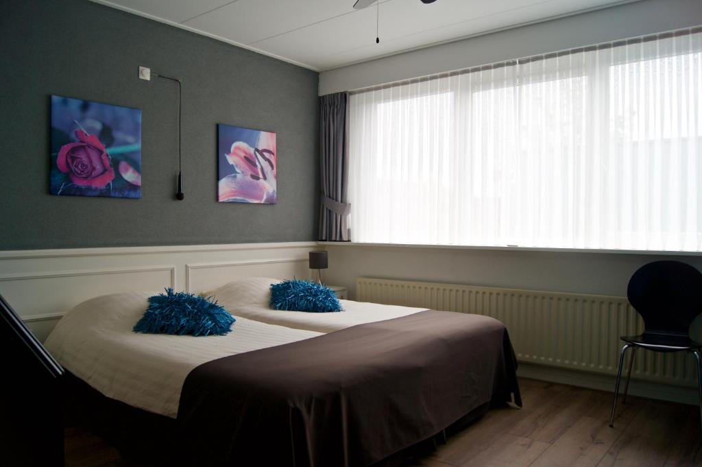 Postel nebo postele na pokoji v ubytování The Studio Guesthouse