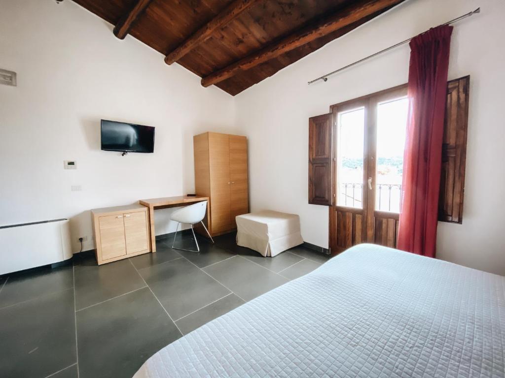 Postel nebo postele na pokoji v ubytování Giardino Sul Duomo