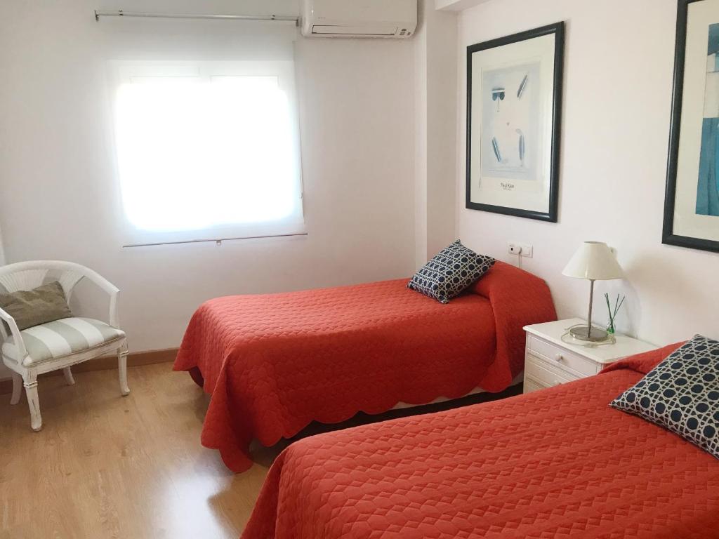Posteľ alebo postele v izbe v ubytovaní Apartamento Millán