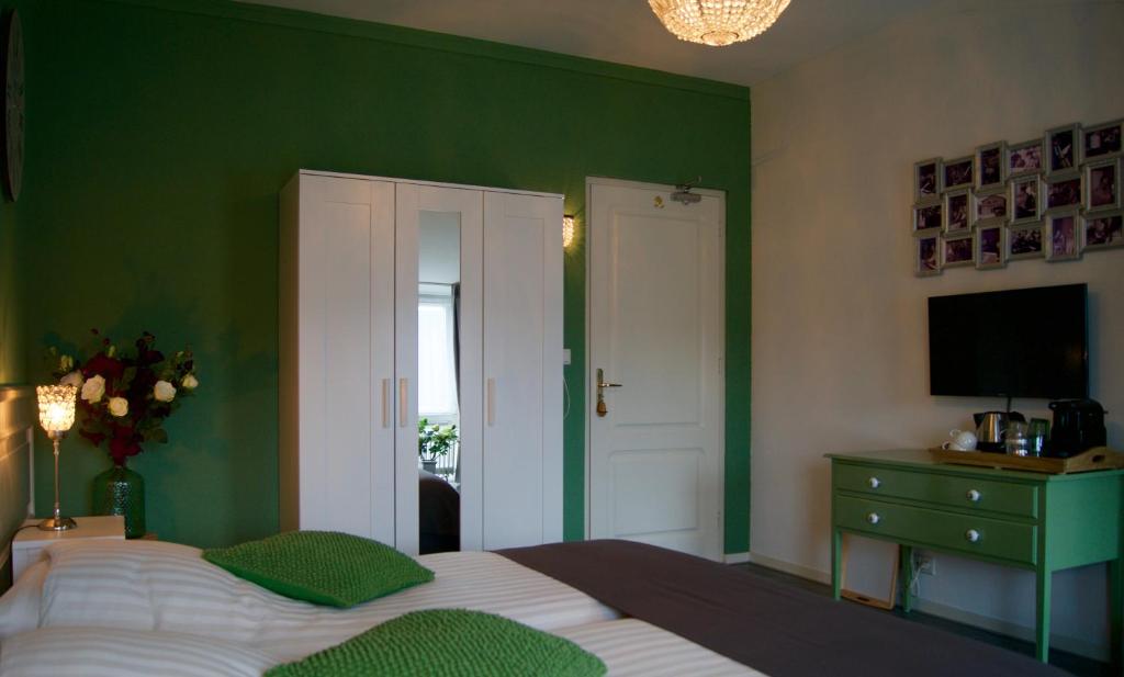 Postel nebo postele na pokoji v ubytování The Studio Guesthouse