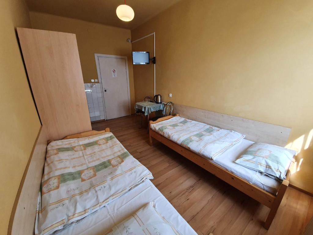 Postel nebo postele na pokoji v ubytování Dom Turysty PTTK w Bielsku - Białej