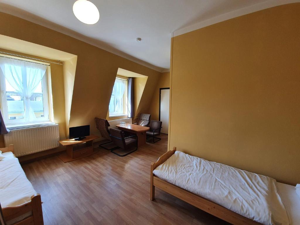 Postel nebo postele na pokoji v ubytování Dom Turysty PTTK w Bielsku - Białej