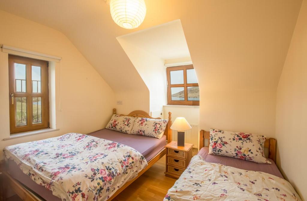 Postel nebo postele na pokoji v ubytování Mount Brandon Hostel