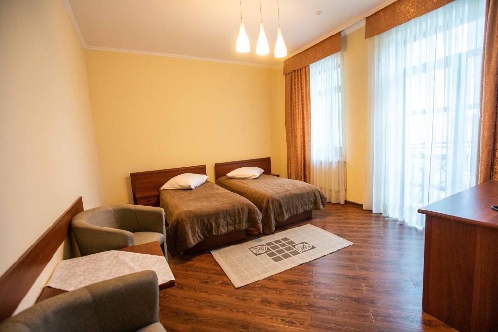 Postel nebo postele na pokoji v ubytování Карпаты