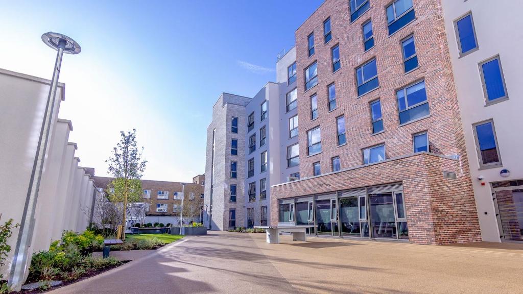 an empty street in front of a building at Heyday Student Accommodation in Dublin