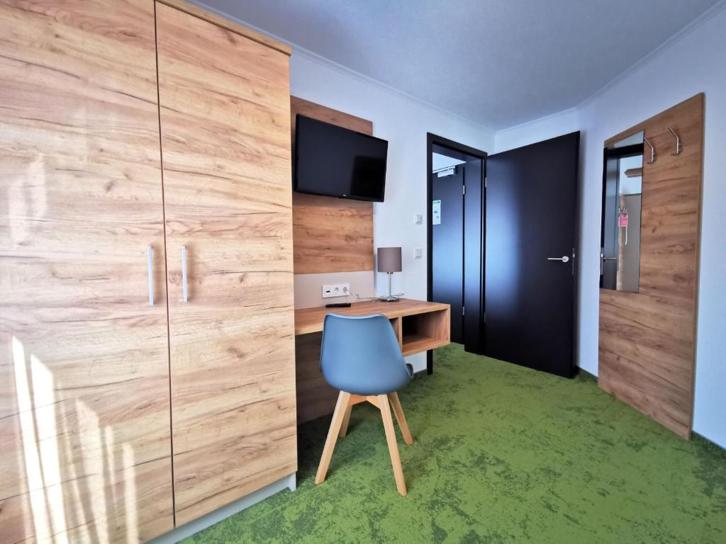 TV a/nebo společenská místnost v ubytování Hotel-Pension Treppengasse Nr 6