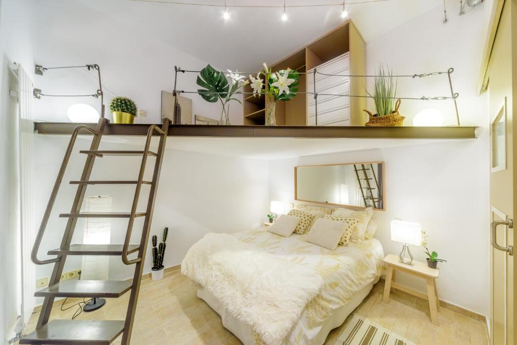 Ένα ή περισσότερα κρεβάτια σε δωμάτιο στο STYLISH LOFT AT CHUECA´S HEART