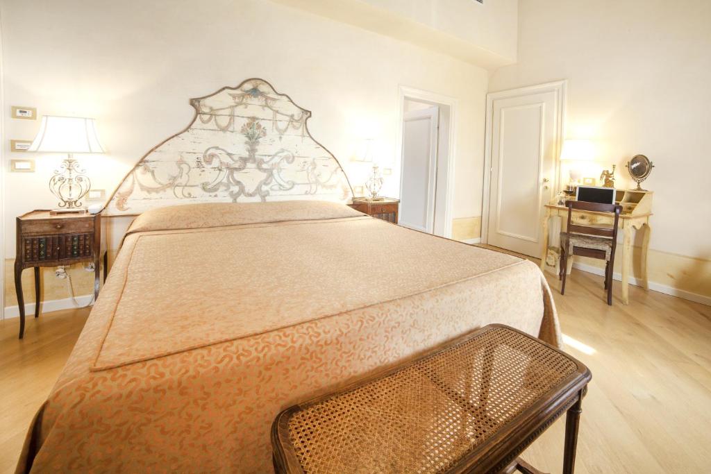 Postel nebo postele na pokoji v ubytování Relais Fra' Lorenzo