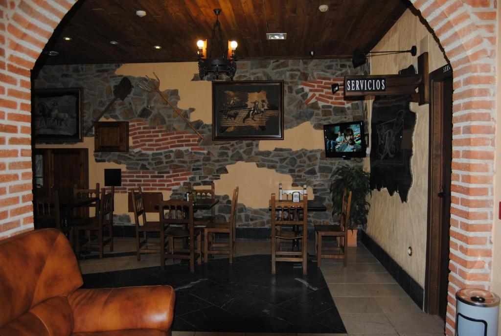 TV a/nebo společenská místnost v ubytování Hotel Rural El Rocal