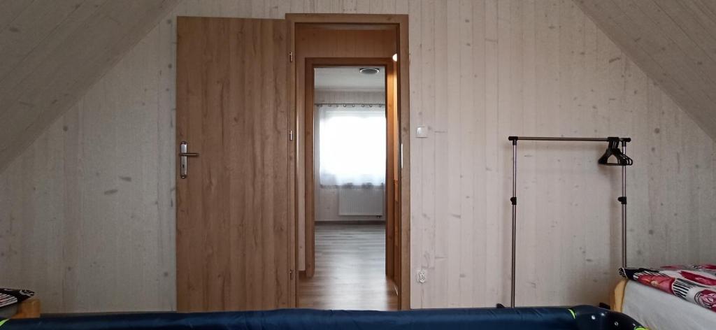 Posteľ alebo postele v izbe v ubytovaní Domki Noce i dnie
